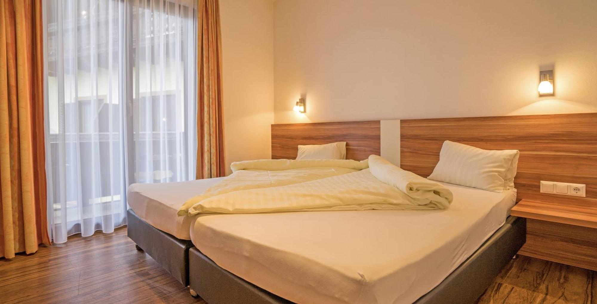 Haus Stampfer Hotell Weissensee Rum bild